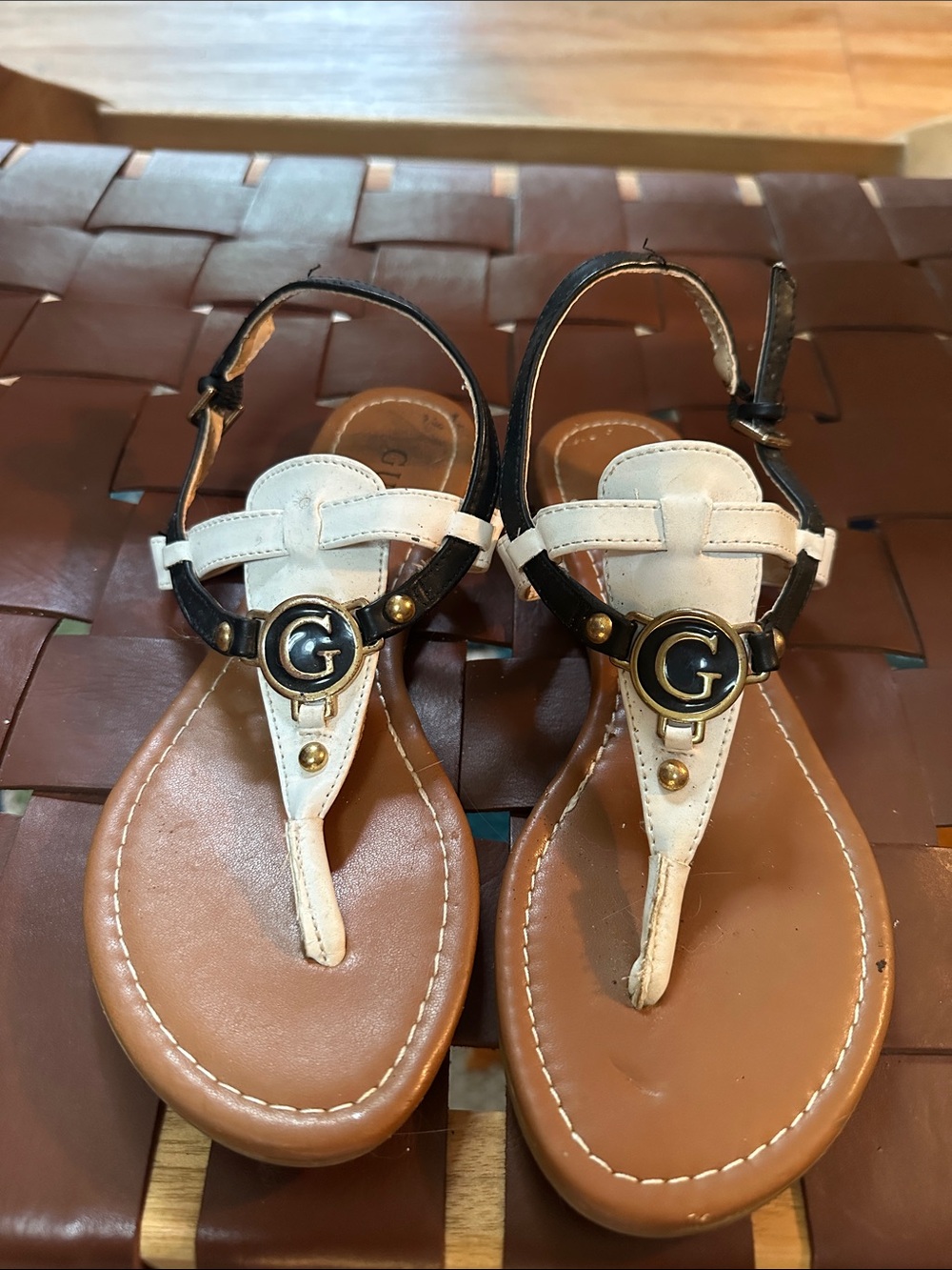 Guess White and Black Leather T-Strap Sandals with Gold Logo